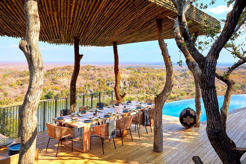 Singita Malilangwe House outdoor dining and swimming pool