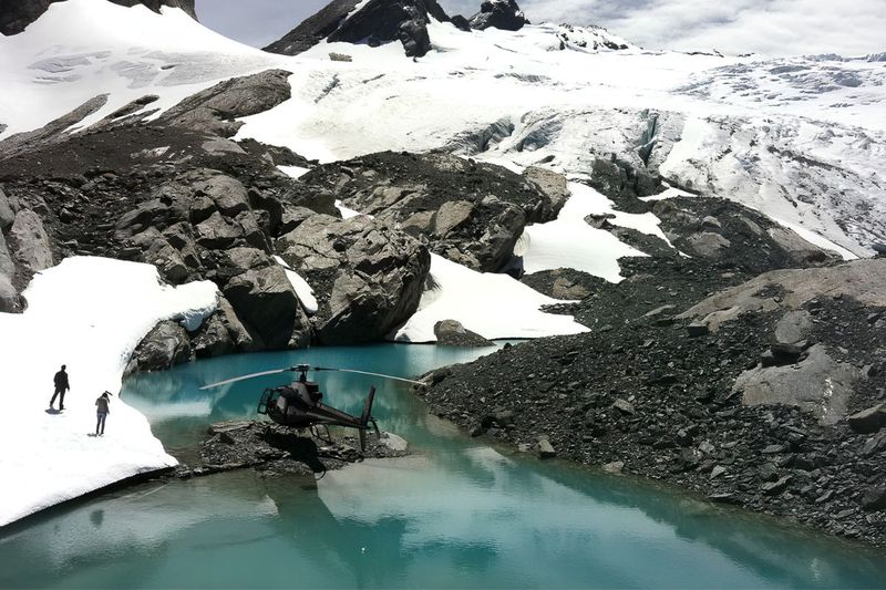 Helicopter tour of Milford Sound alpine lake landing