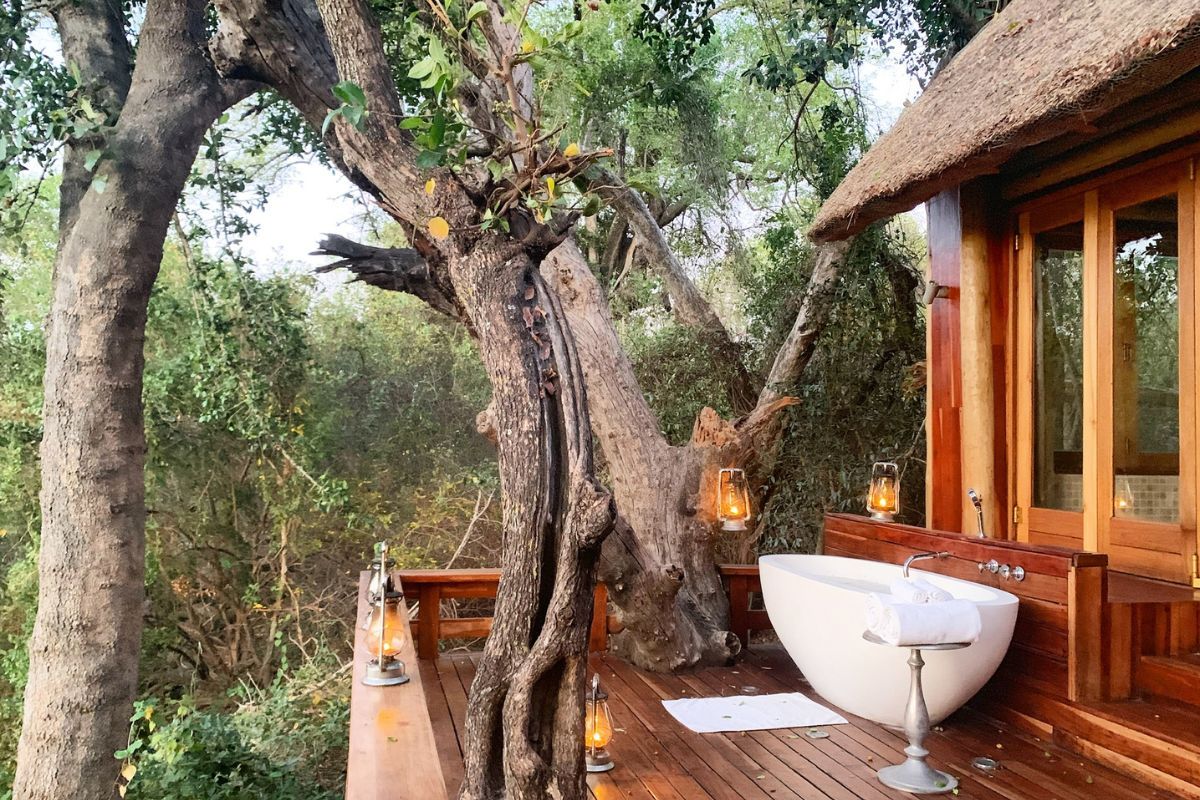 AF Zambia Royal Chundu Island Lodge deck for Soak in Style: Outdoor Bathtubs Are the Ultimate Luxury Escape