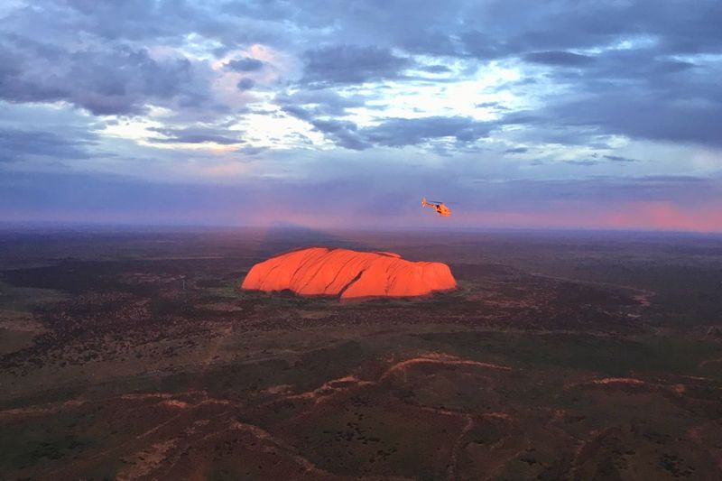 Helicopter tour of Uluru at sunset