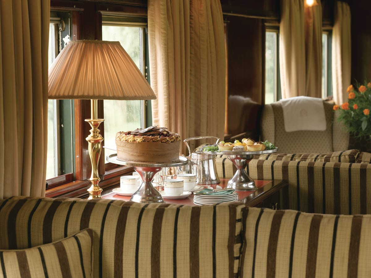 Afternoon tea arranged in the lounge car aboard Rovos Rail