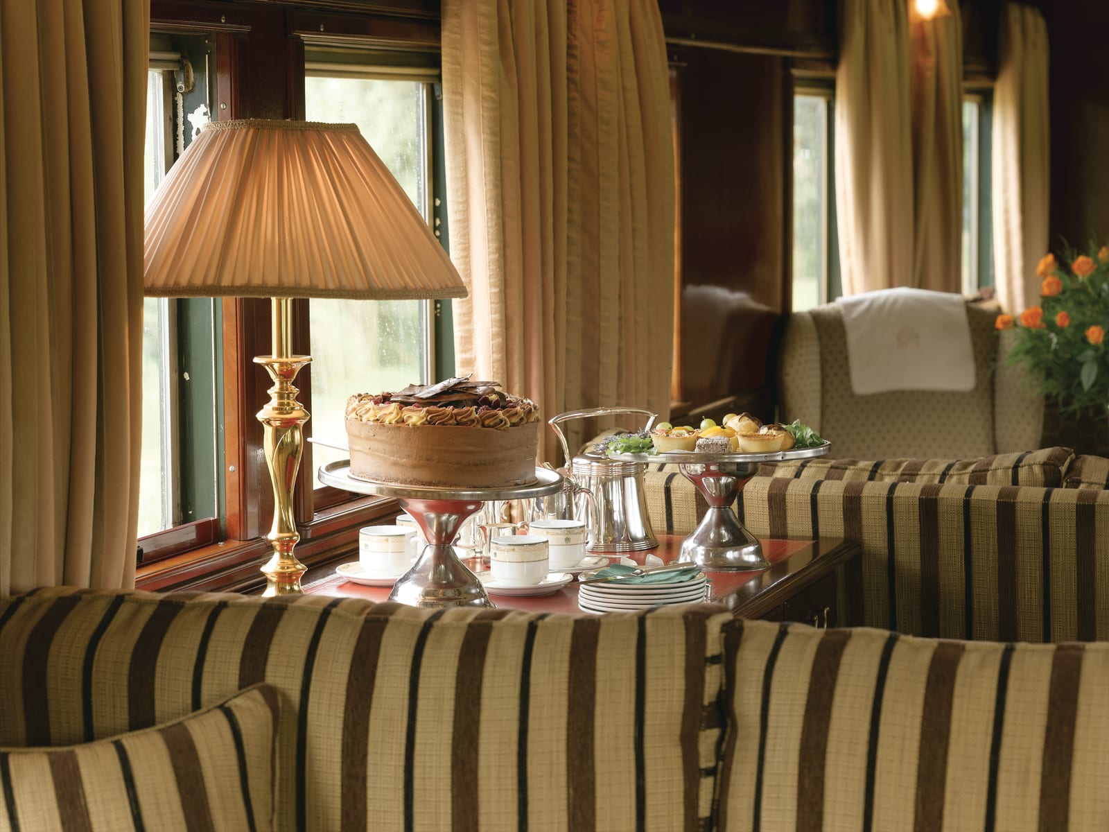 Afternoon tea arranged in the lounge car aboard Rovos Rail