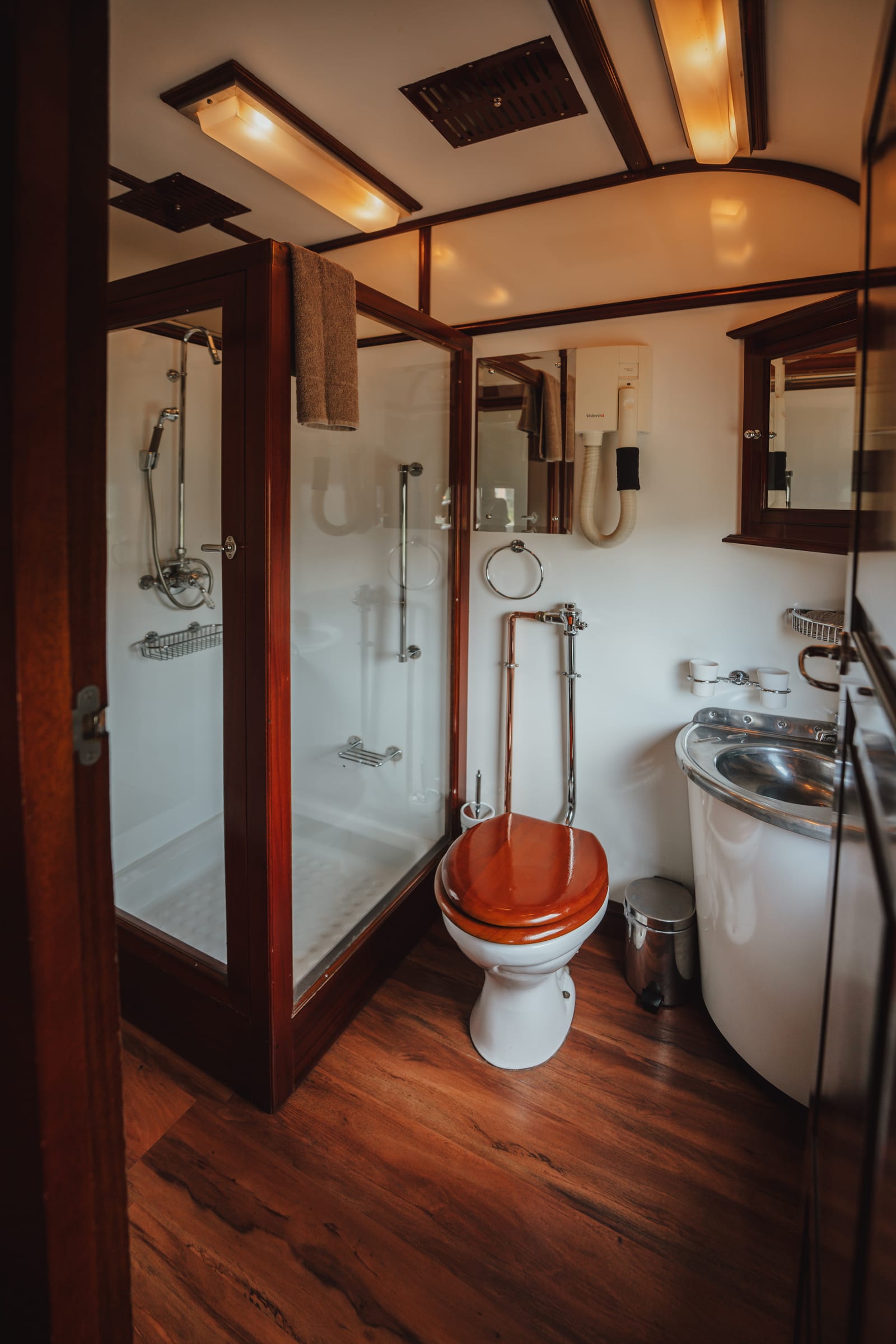 Private bathroom with a shower inside a Deluxe Suite