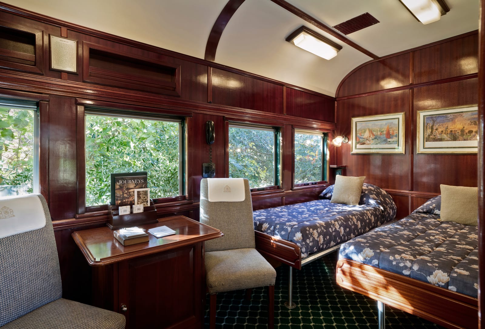 Deluxe Suite arranged with lengthways split twin beds