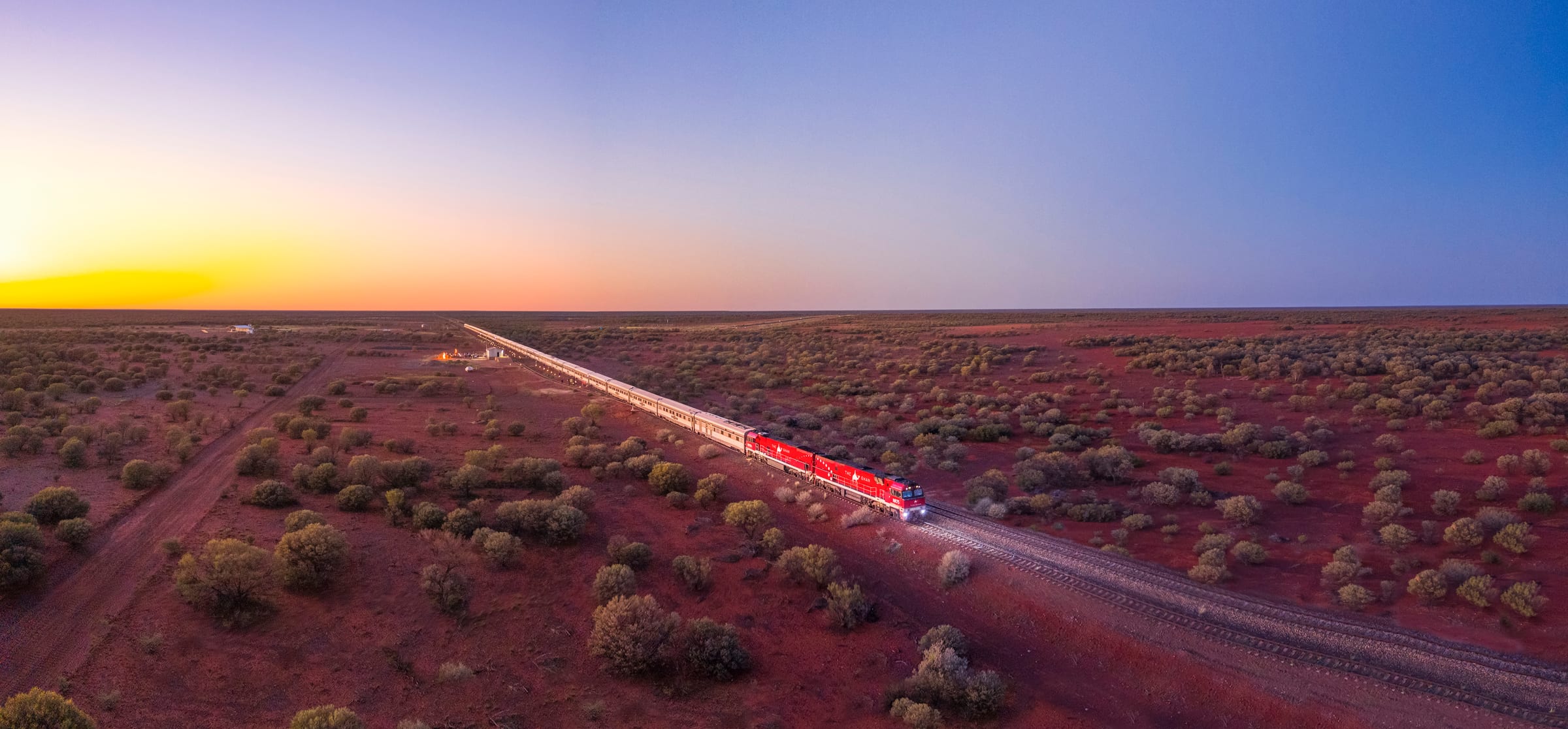 The Ghan crossing the outback near Marla at sunrise in South Australia